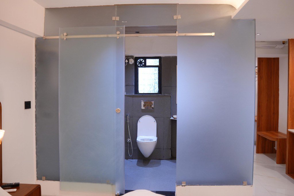 Attached bathroom in the Deluxe AC Room
