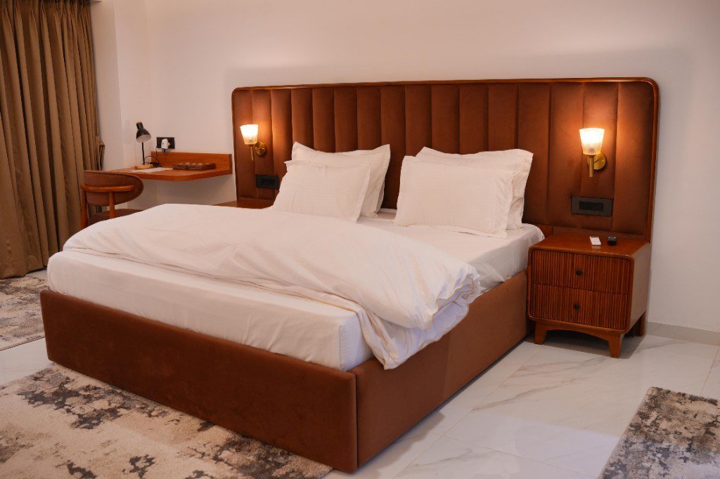 Bed in the Deluxe AC Room